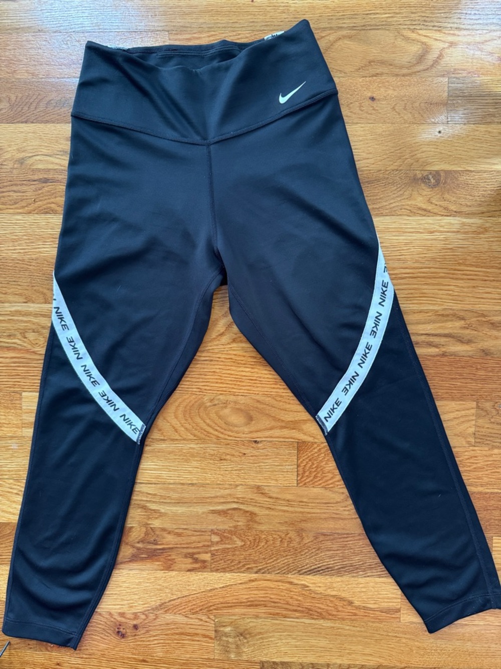 Nike woman’s Leggings with Reflective White Logo Trim